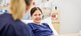 Photo of a nurse caring for a patient